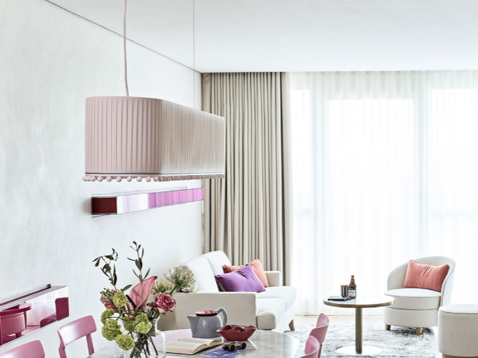 Detail of the pink pleated pendant in the dining area