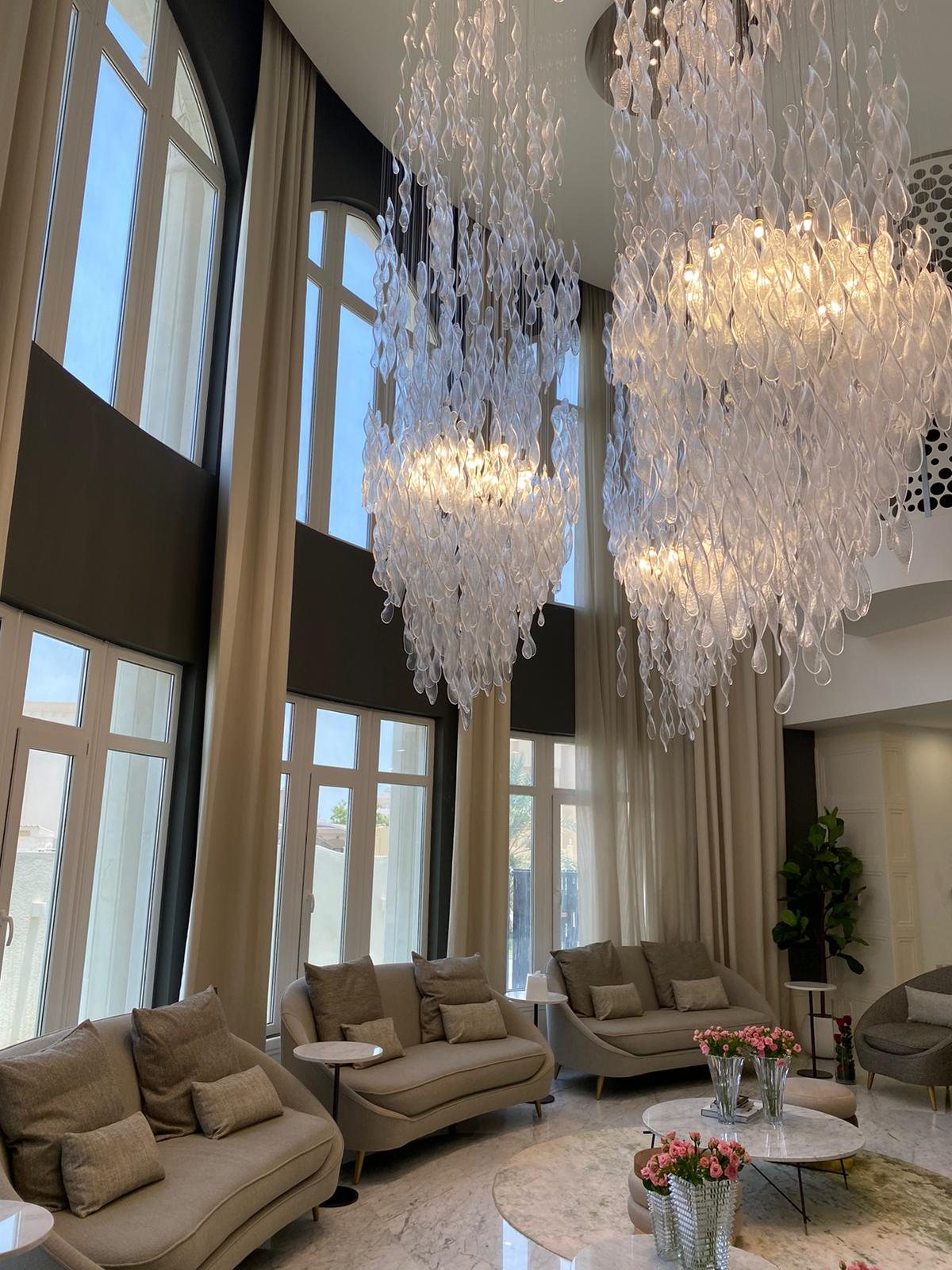 Bespoke glass cascades in a double-height living room