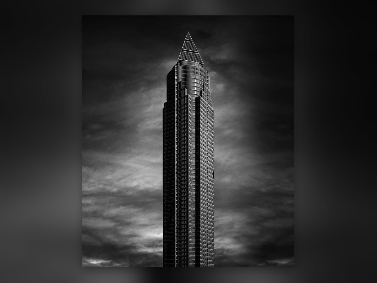 Helmut Jahn's Messeturm tower in Frankfurt, photographed from below against the sky