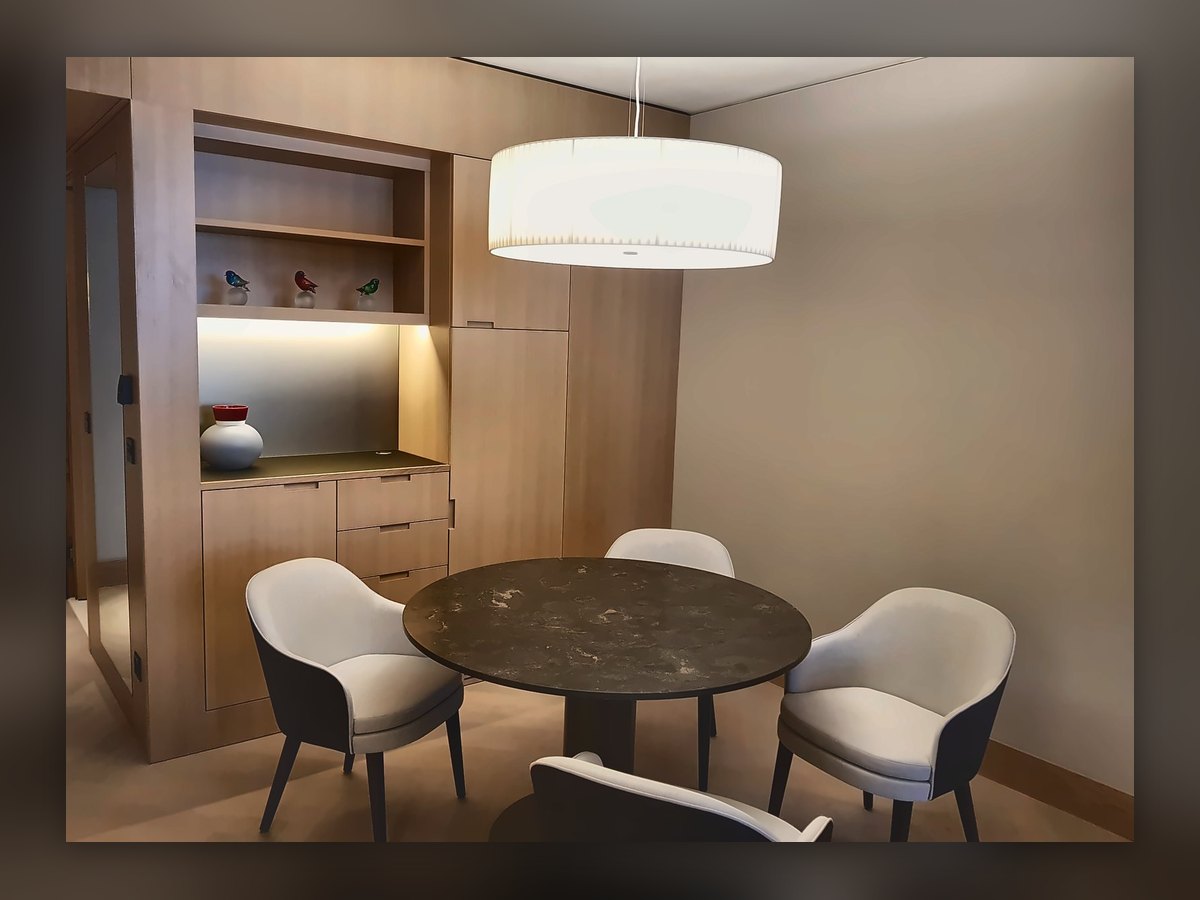Drum pendant above the round table of a Waldhotel suite