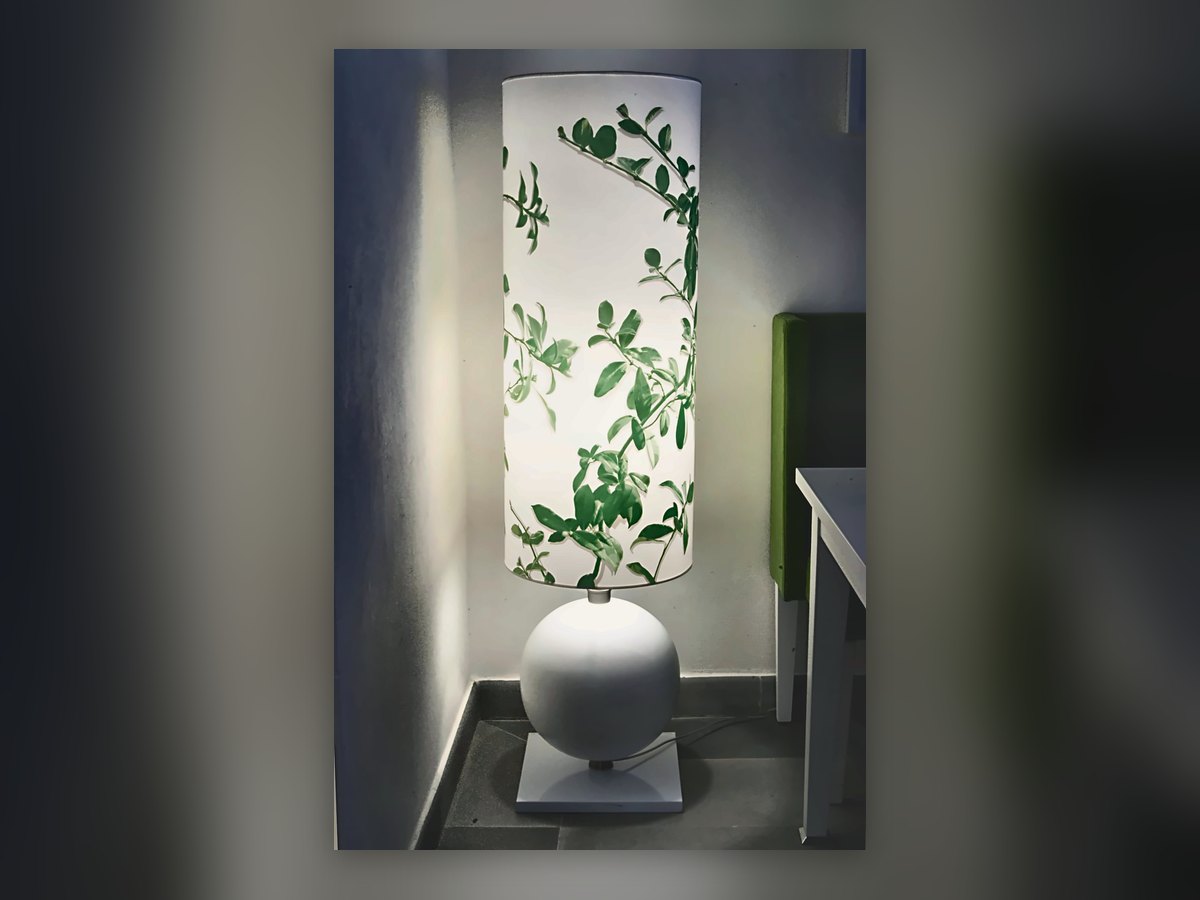 Floor lamp with botanical-print cylinder on a sphere base