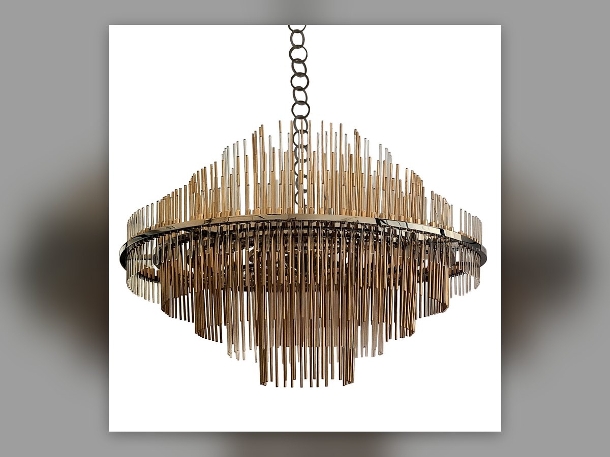 The finished chandelier seen three-quarters on, with its suspension chain