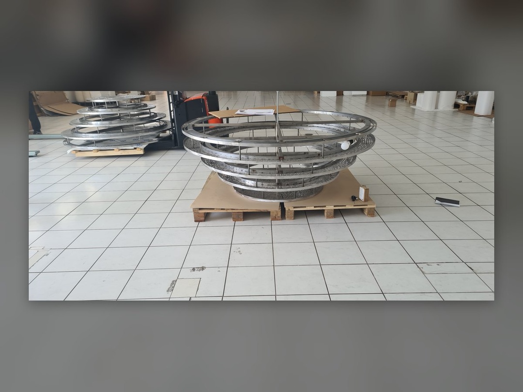 round chandelier hanging in the workshop