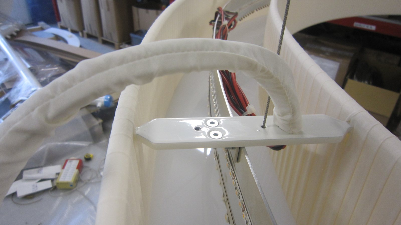 LED strip and suspension bracket inside an EVA shade