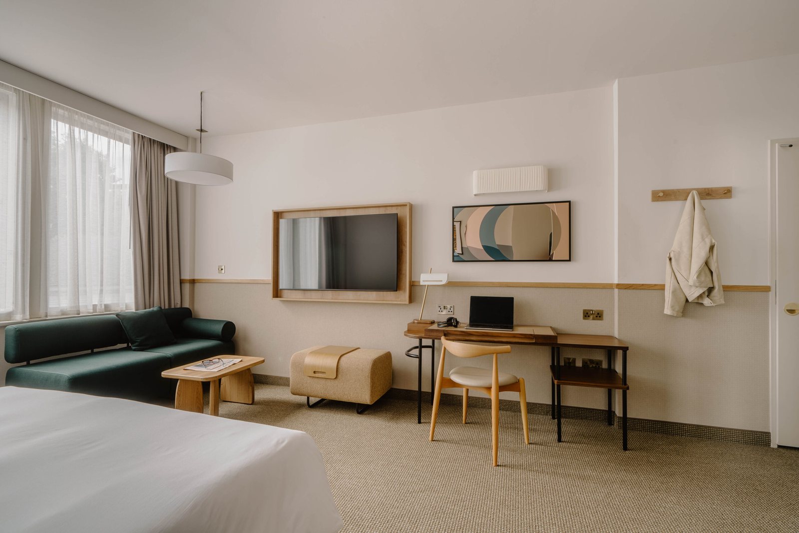 Superior room at Club Quarters St Paul's, London: E12 ivory pleated fabric wall light above the TV and the desk