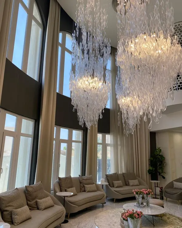 Bespoke glass cascades in a double-height living room